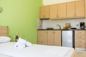 Kuchyňa alebo kuchynka v ubytovaní Golden Sun Villas