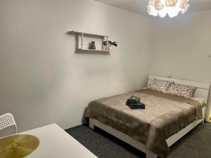 Łóżko lub łóżka w pokoju w obiekcie :: Apartment City Center ::