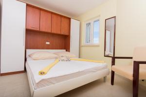 Postel nebo postele na pokoji v ubytování Apartment Ljuba
