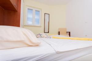 Postel nebo postele na pokoji v ubytování Apartment Ljuba