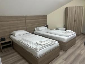 Voodi või voodid majutusasutuse Olive hotel toas