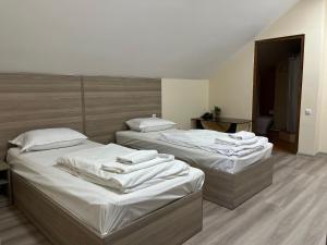 Voodi või voodid majutusasutuse Olive hotel toas