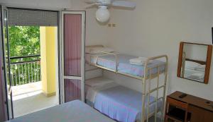 Postel nebo postele na pokoji v ubytování Hotel Samoa