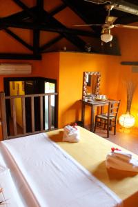 A bed or beds in a room at La Fattoria Delle Tartarughe