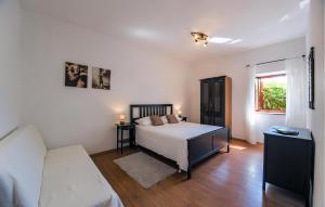 Posteľ alebo postele v izbe v ubytovaní Holiday Home Koromani V