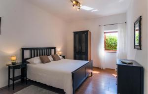 Posteľ alebo postele v izbe v ubytovaní Holiday Home Koromani V