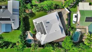 an aerial view of a house with a solar panel at Villa Ibis Family Home with Pool in Kewarra Beach in Kewarra Beach