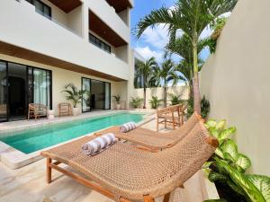 an image of a villa with a swimming pool at Lumix Residence in Munggu +35 photos