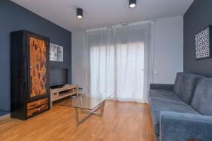 TV/Unterhaltungsangebot in der Unterkunft Bright and modern Duplex with terrace in Eixample district P2