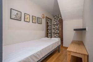 Ein Bett oder Betten in einem Zimmer der Unterkunft Bright and modern Duplex with terrace in Eixample district P2