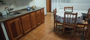 Kuchyň nebo kuchyňský kout v ubytování Apartamentos Nelly