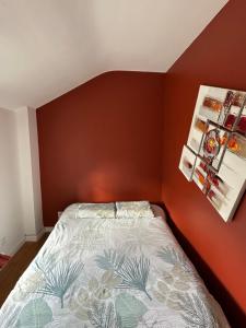 Uma cama ou camas num quarto em Le coin caché