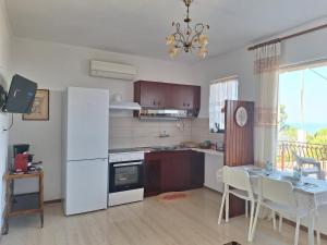 Kuchyň nebo kuchyňský kout v ubytování LASSI Apartment 2