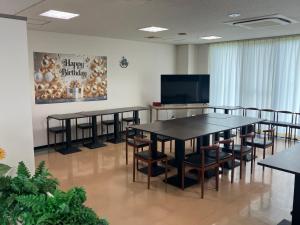 TV a/nebo společenská místnost v ubytování 豊前市国際交流会館