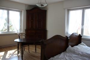 Postel nebo postele na pokoji v ubytování Gîte du moulin