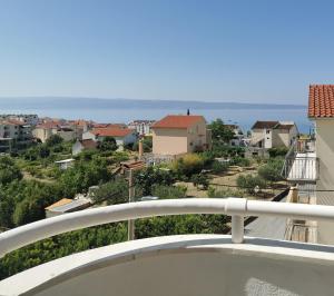 a balcony with a view of a city at Tonka 1 in Podstrana
