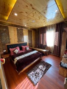 Postel nebo postele na pokoji v ubytování Nubra House