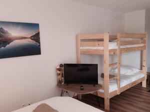 Postel nebo postele na pokoji v ubytování Studio Le Panoramic les Balcons d'Aix + 16 fotografií