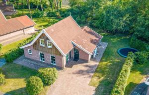 an overhead view of a house with a roof at Buitengoed Het Lageveld - 52 in Hoge-Hexel