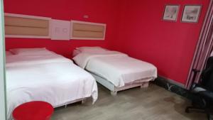 Weiyi Boutique Hotel客房内的一张或多张床位
