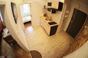 Kuchyňa alebo kuchynka v ubytovaní Apartament Poznań Jeżyce
