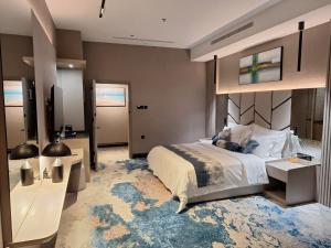 Ένα ή περισσότερα κρεβάτια σε δωμάτιο στο Taj Lives Hotel +49 φωτογραφίες