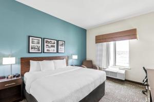 Postel nebo postele na pokoji v ubytování Sleep Inn Lufkin