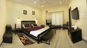 Postel nebo postele na pokoji v ubytování Pearl of Taj Home Stay