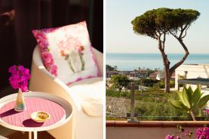 a room with a table and a window with a tree at Villa Cannizzaro in Catania