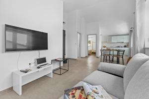 TV a/nebo společenská místnost v ubytování Apartmani Paliska