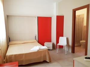 A bed or beds in a room at L'Isola del Sale