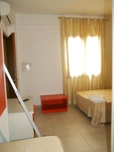 A bed or beds in a room at L'Isola del Sale