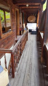 a living room with wooden benches and a bed at Chalet Spillstatt in Grindelwald