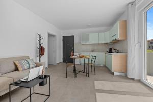 Kuchyň nebo kuchyňský kout v ubytování Apartmani Paliska