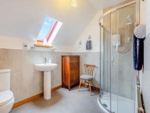 a bathroom with a sink toilet and a shower at Drummond House Uk42979 in Brackley
