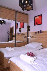 Ένα ή περισσότερα κρεβάτια σε δωμάτιο στο Apartament Kielce Lecha