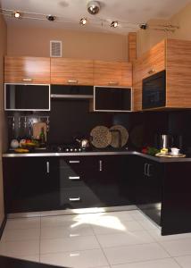 Η κουζίνα ή μικρή κουζίνα στο Apartament Kielce Lecha