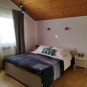 Posteľ alebo postele v izbe v ubytovaní Apartments Garden Zagreb