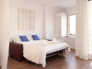 Ліжко або ліжка в номері Stay U-nique Apartments Sant Pau