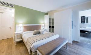 Voodi või voodid majutusasutuse Hotel Garni Corona toas