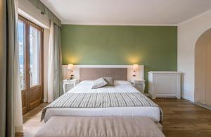 Voodi või voodid majutusasutuse Hotel Garni Corona toas