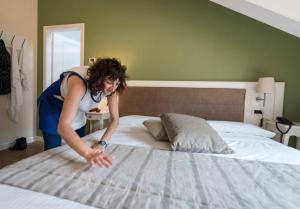 Voodi või voodid majutusasutuse Hotel Garni Corona toas
