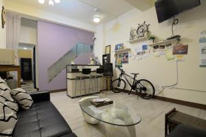 Een TV en/of entertainmentcenter bij Meet ‧ Happiness B&B
