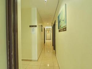 Kampong Kuala PuntiにあるHotel CheckedInnのギャラリーの写真