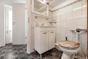 Koupelna v ubytování Feel Meer + 30 fotografií