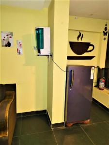 Η κουζίνα ή μικρή κουζίνα στο KK Beach View Residency