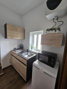 Kuchyň nebo kuchyňský kout v ubytování Modern studio near Valleta