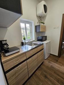 Kuchyň nebo kuchyňský kout v ubytování Modern studio near Valleta