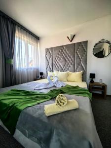 Postel nebo postele na pokoji v ubytování Zigen House