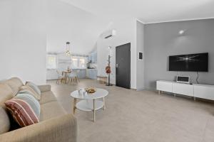 TV a/nebo společenská místnost v ubytování Apartmani Paliska
